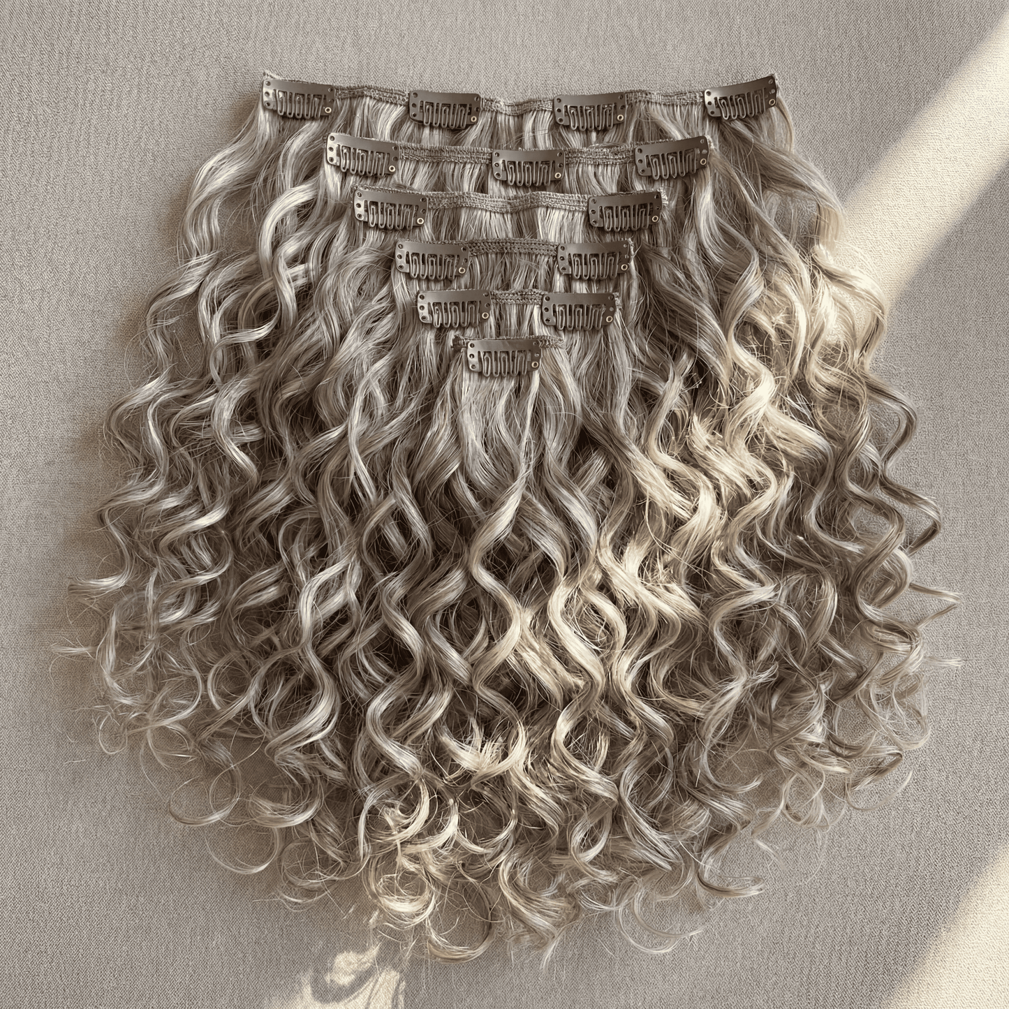 7‑Piece Clip‑In Curly Hair Extension Set – 55cm Ash & Light Blonde Mix (#18/613)